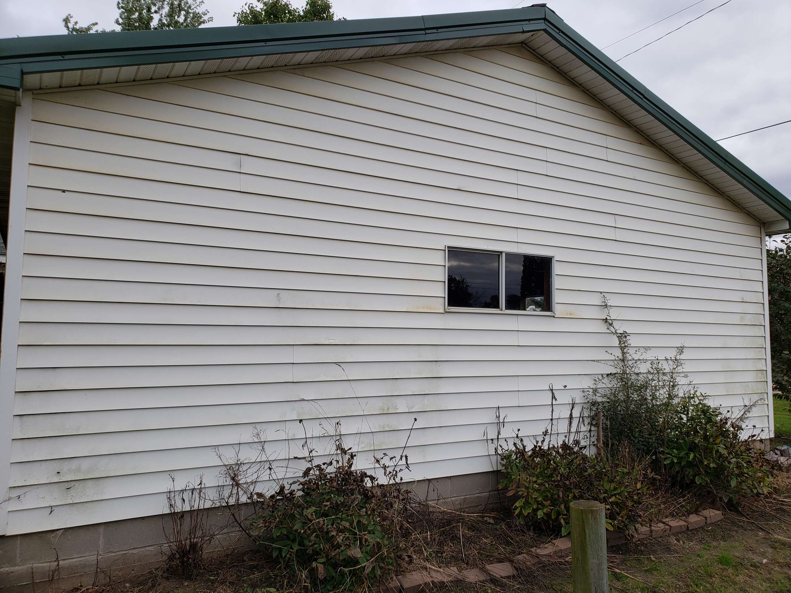 Before painting back of garage